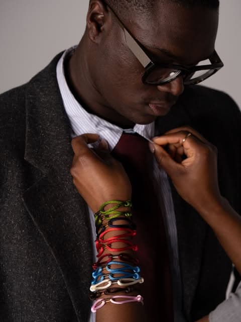 ONE bracelets styled with a suit